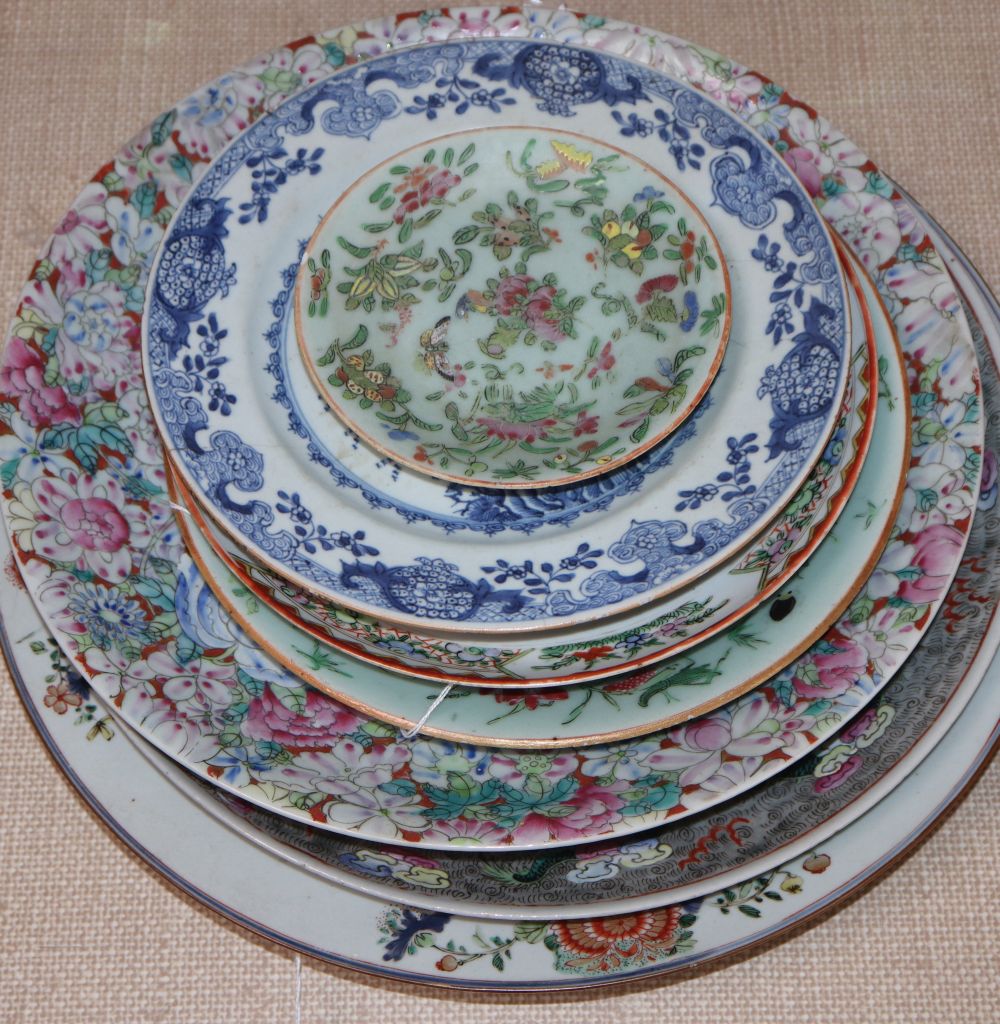 A collection of Oriental chargers and plates,